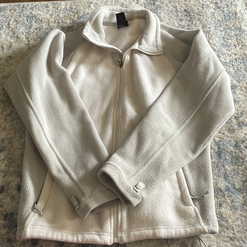 White and gray North Face fleece jacket